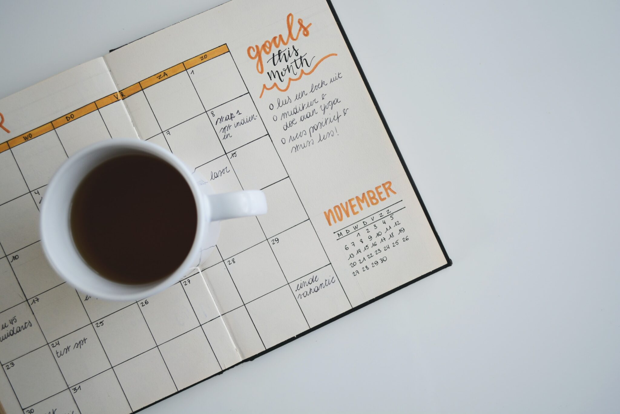 Coffee cup on calendar